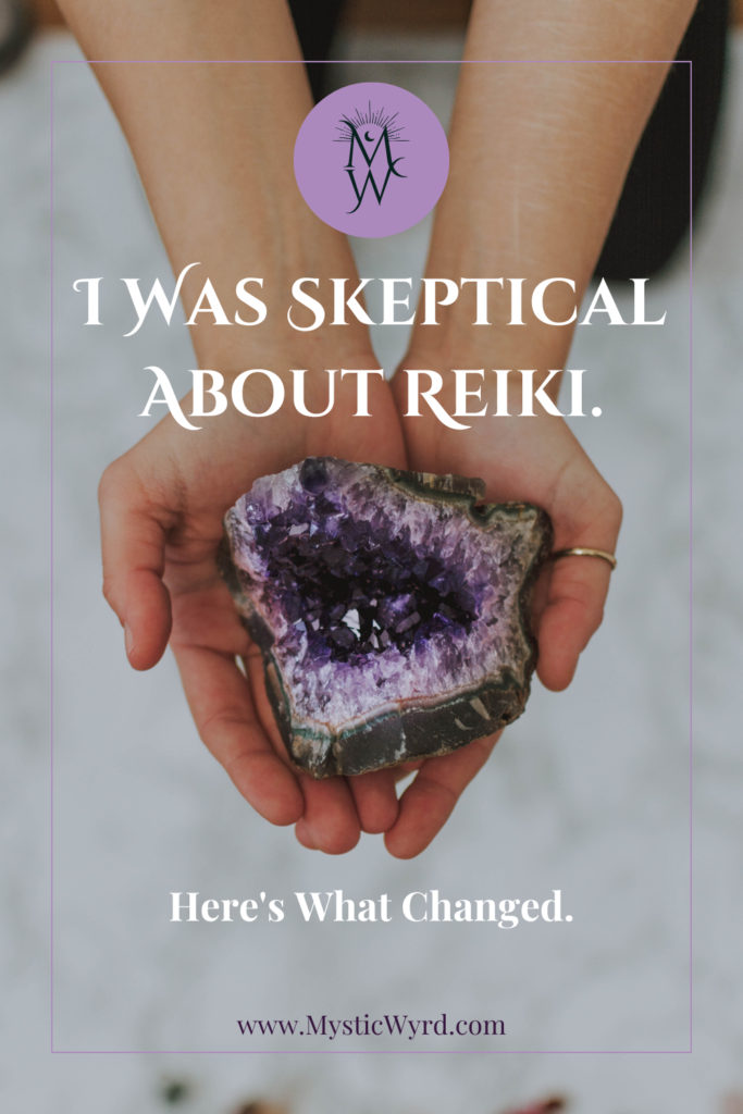 Hands holding a crystal with the words "I was skeptical about Reiki. Here's what changed."
