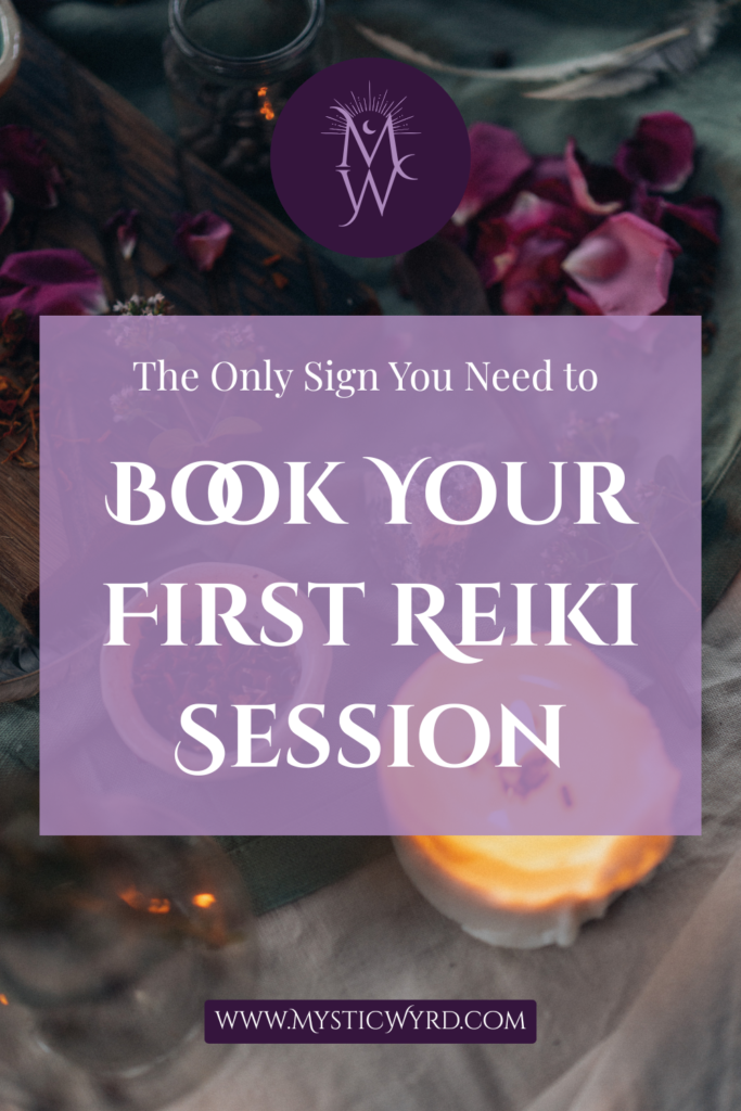 Dried flowers and candles with the words "The only sign you need to book your first Reiki session."