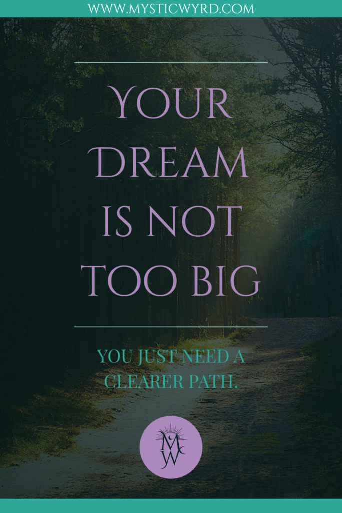 Sunlit path in a forest with the words "Your dream is not too big. You just need a clearer path."